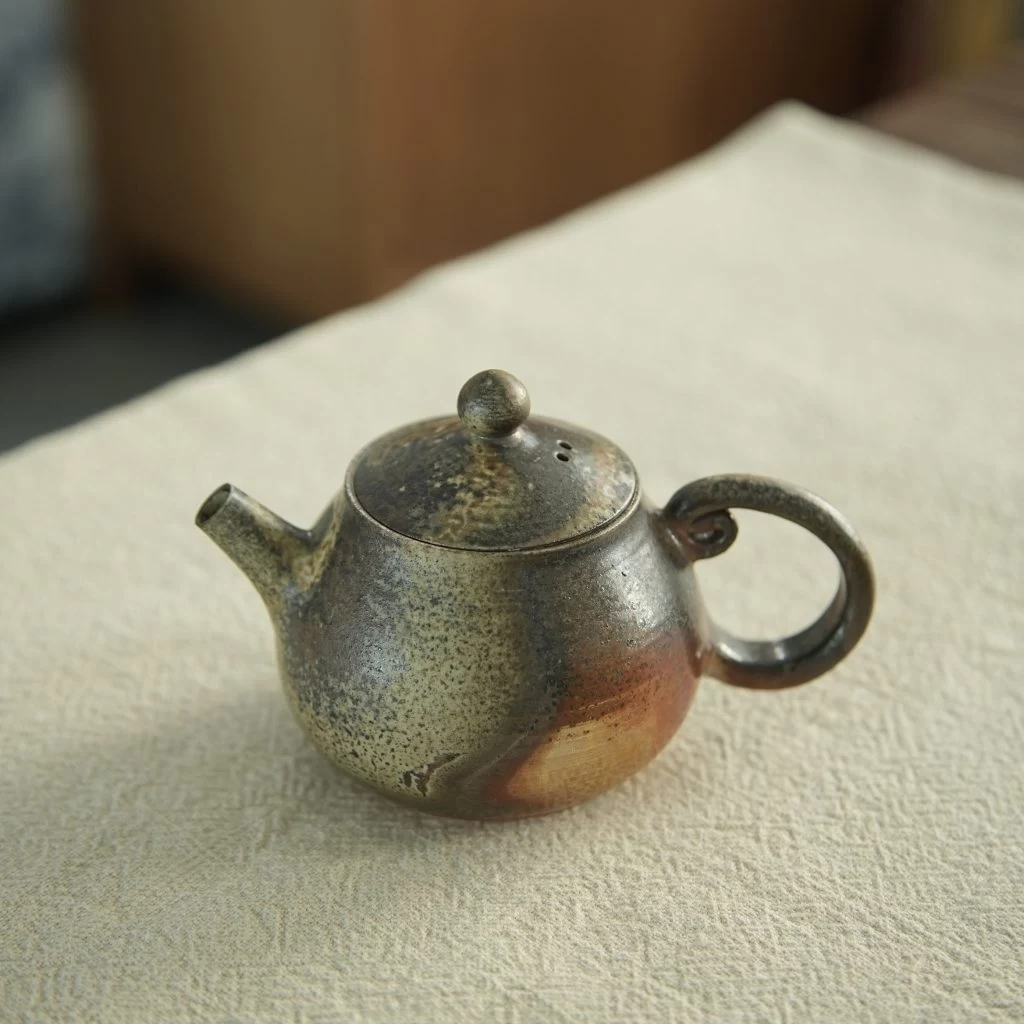 Handmade Wood-Fired Teapot | Natural Ash Glaze & Dramatic Fire Marks, Contrasting Metallic Rust Finish, 160 ml detail 9