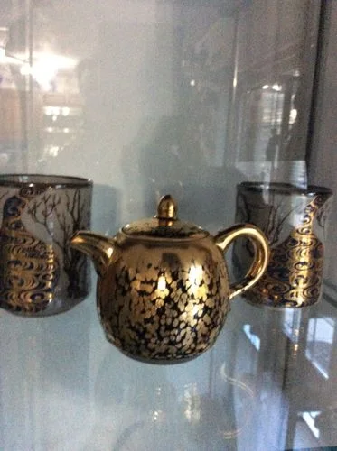 Customer photo review of Gold Teapot