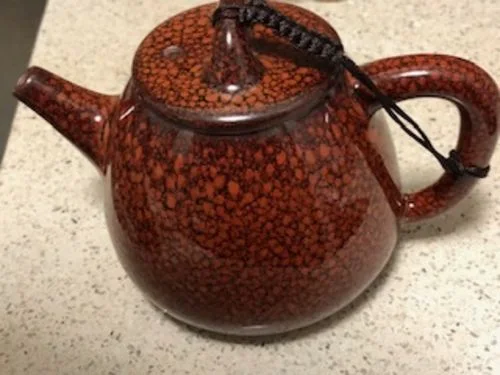 Customer photo review of Orange Teapot