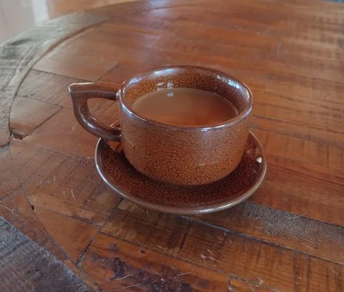 Customer photo review of Orange Coffee Cup