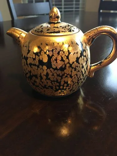 Customer photo review of Gold Teapot