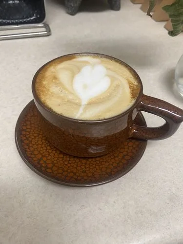 Customer photo review of Orange Coffee Cup