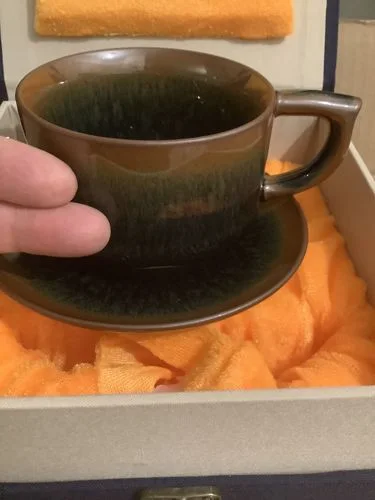 Klantenbeoordeling met foto van de Palm-koffiebeker