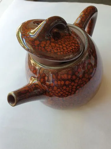 Customer photo review of Orange Teapot