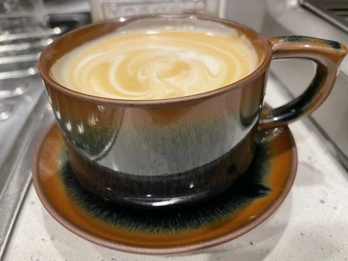 Klantenbeoordeling met foto van de Palm-koffiebeker