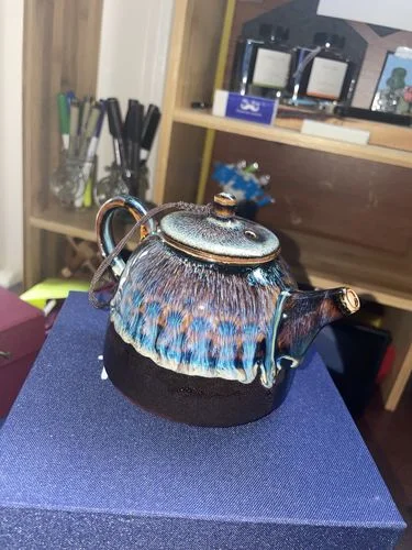 Customer photo review of Golden Peacock Teapot