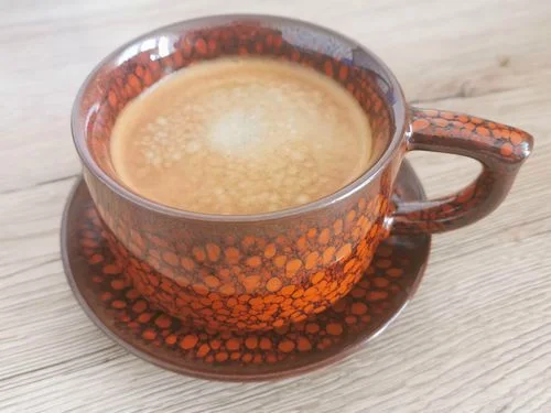 Customer photo review of Orange Coffee Cup