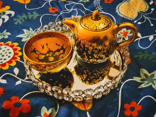 Customer photo review of Gold Teapot