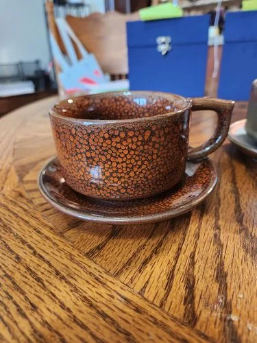 Customer photo review of Orange Coffee Cup