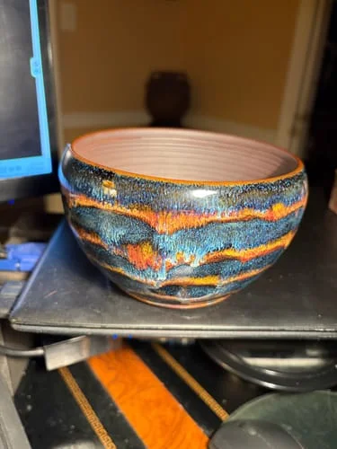 Reviewer's beautiful Panlong Matcha Bowl showing its colorful blue and orange glaze.