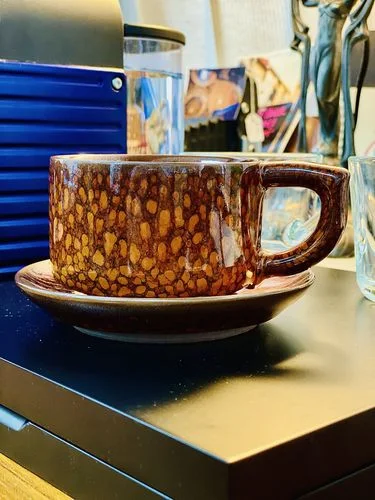 Klantenrecensie met foto van Orange Coffee Cup