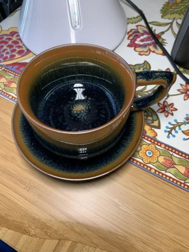 Klantenbeoordeling met foto van de Palm-koffiebeker