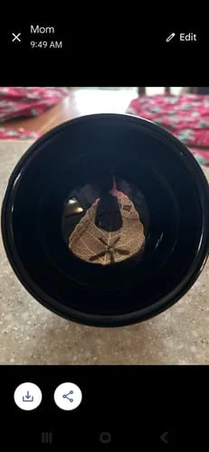 Customer's top-down view of the black Golden Leaf cup, showing the golden leaf detail at the bottom.